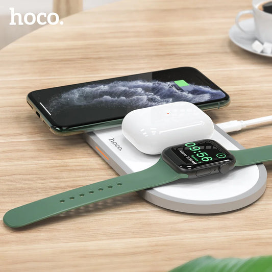 	a charging station with an apple watch and an iphone